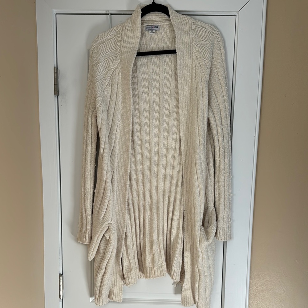 Women’s cream colored cardigan by Fashion Nova